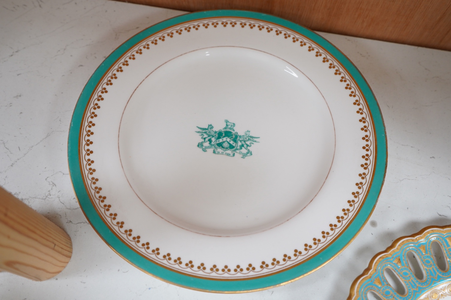 Five mixed 19th and 20th century armorial plates, including Royal Worcester, Spode and a Nelson Rockefeller collectors plate, largest 27cm diameter. Condition - two have gilded bands worn and one scratches to green glazi